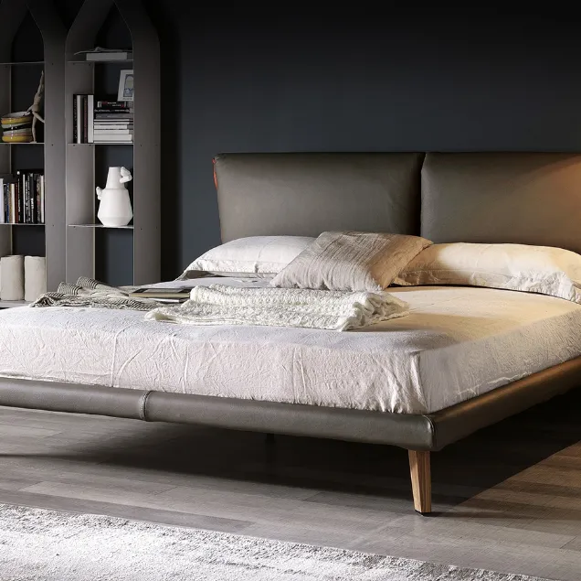 Letto di design in tessuto imbottito con testiera scultura Stones di Noctis